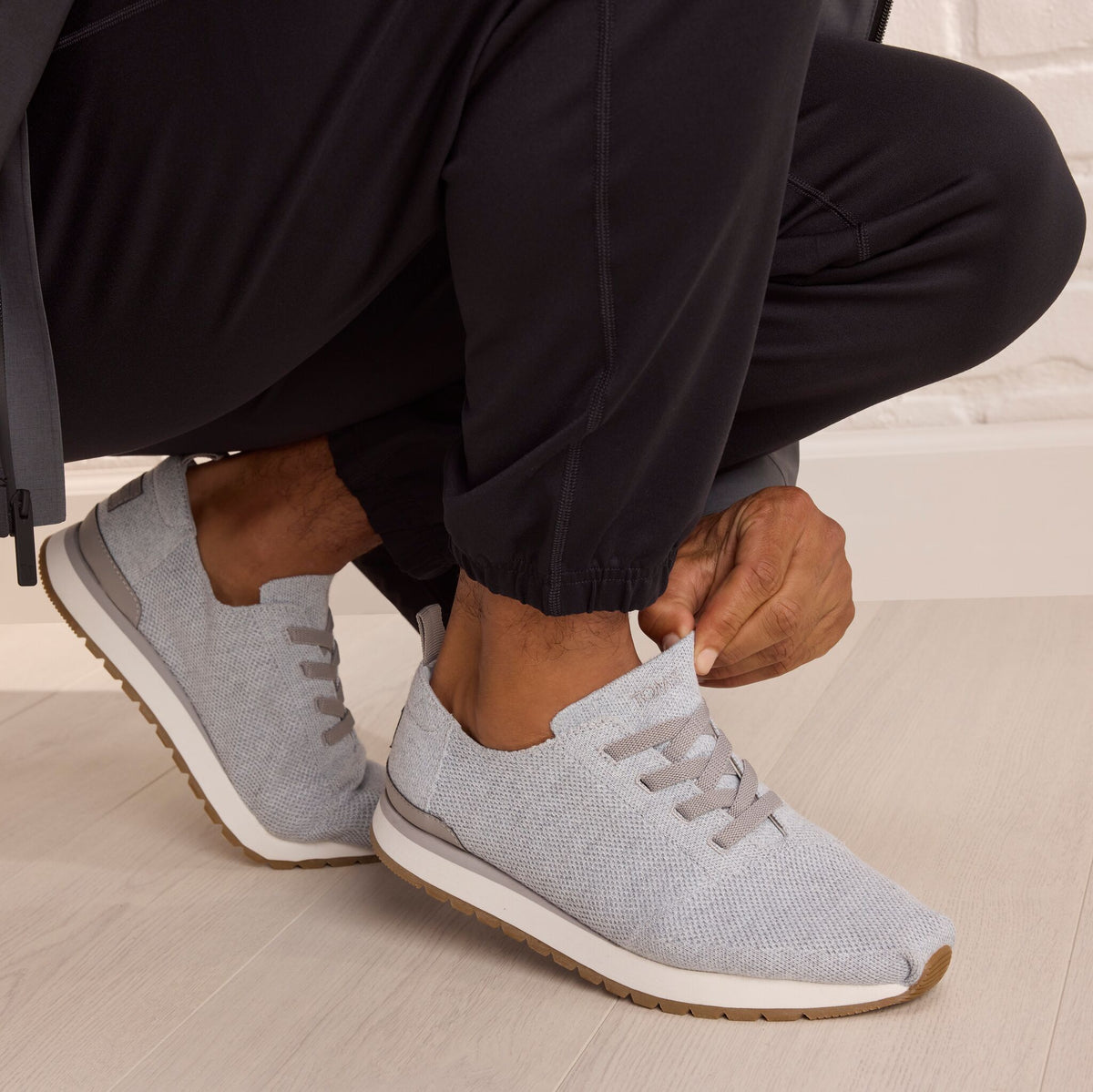 On model image of the grey engineered knit lace up Resident 2.0