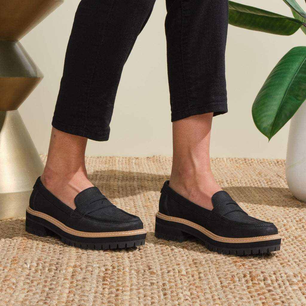 Best Selling Cara Black Leather Loafer On Model Up Close Detail Shot