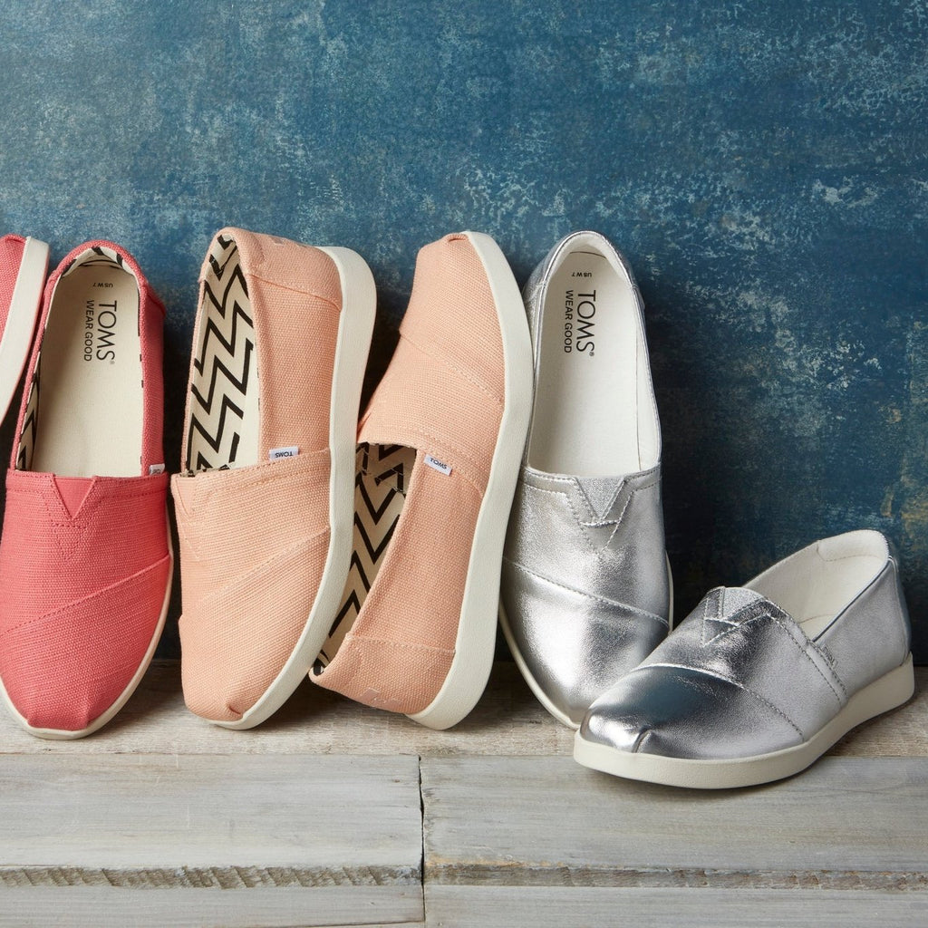 Laydown image of the silver Alpargata Plus slip on shoes