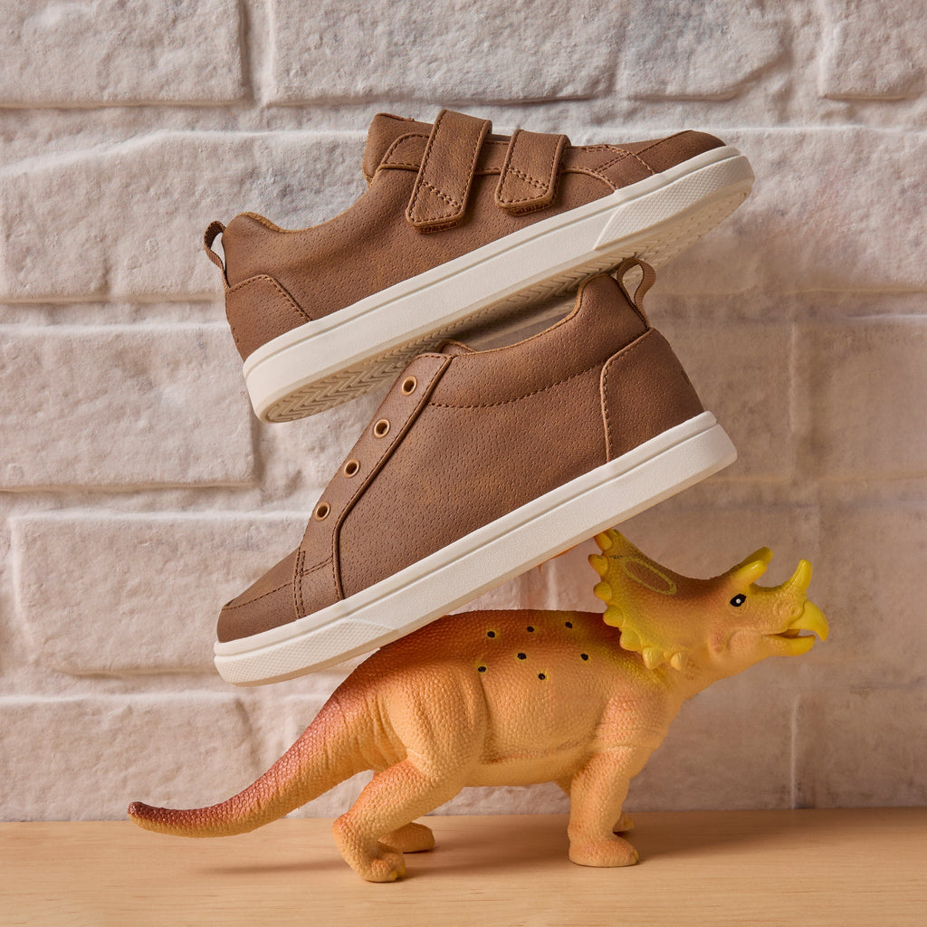 Laydown image of the Cruz Double Strap Toddler Shoe in Toffee Microsuede