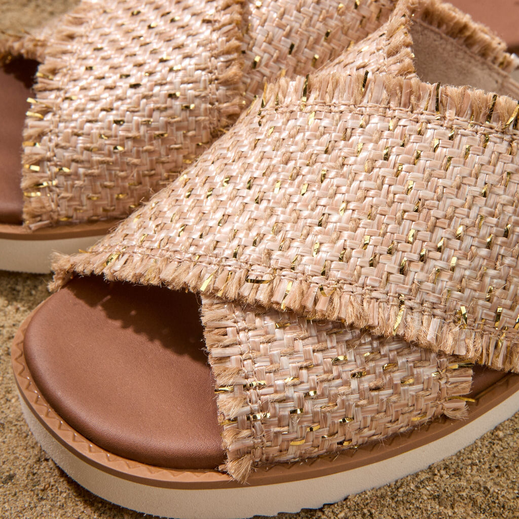 Up close detail shot of the metallic raffia Mae sandal