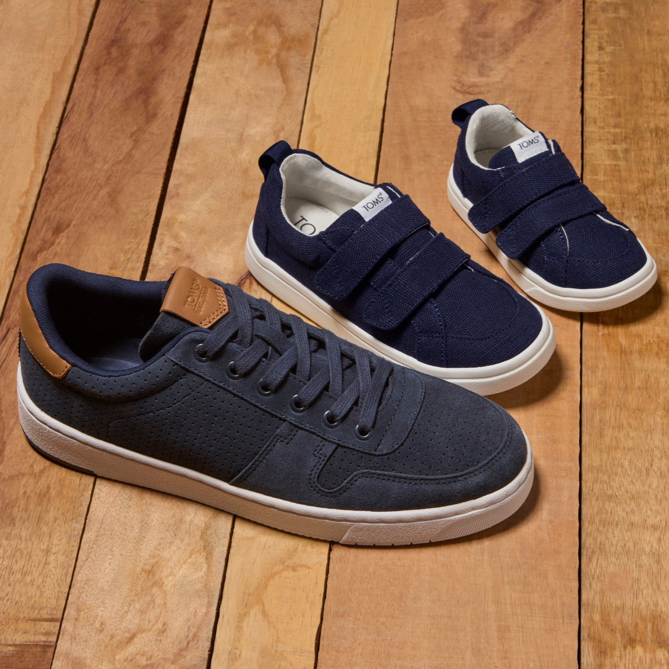 Family Matching Styles in Navy Laydown Shot