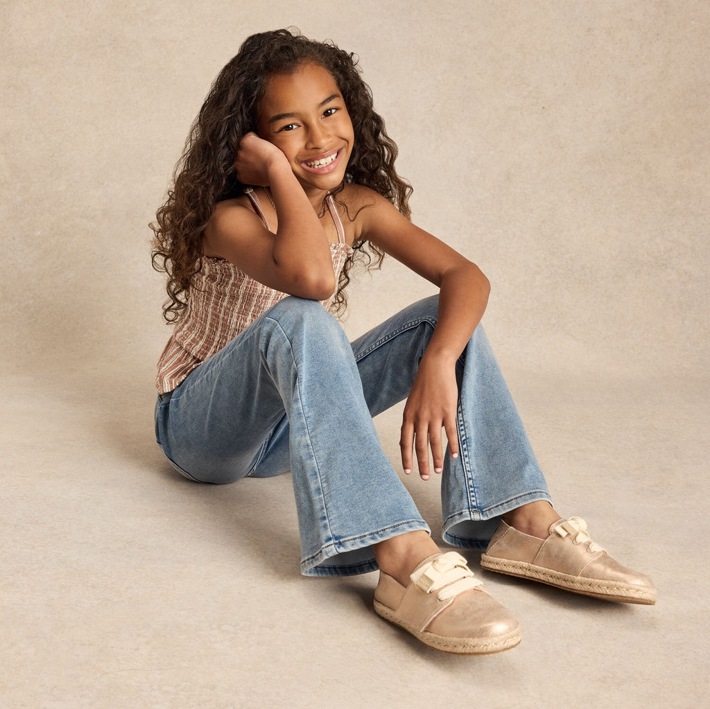 On model image of the metallic seashell Carolina lace up espadrille