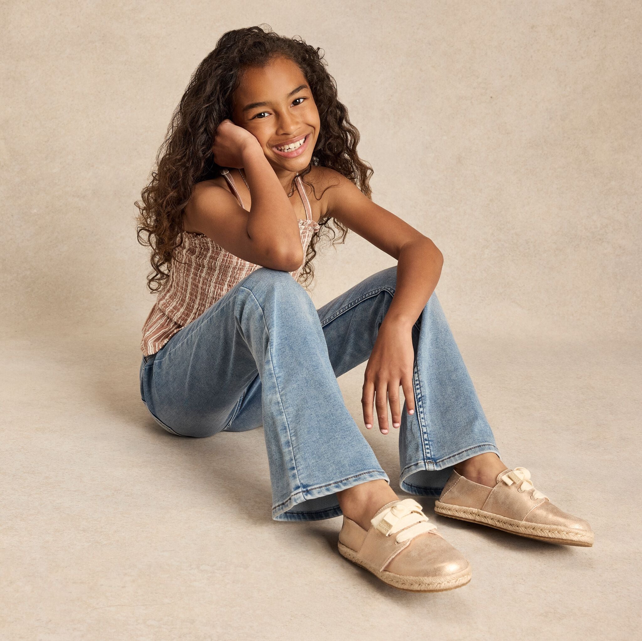 On model image of the metallic seashell Carolina lace up espadrille